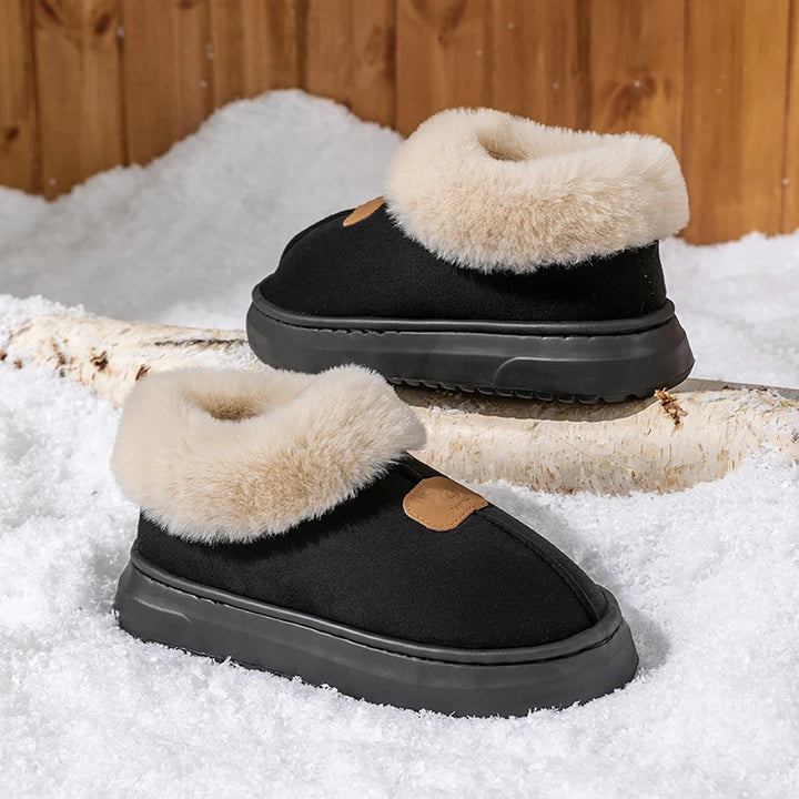Women’s black winter suede snow boots with plush sherpa lining and durable non-slip sole