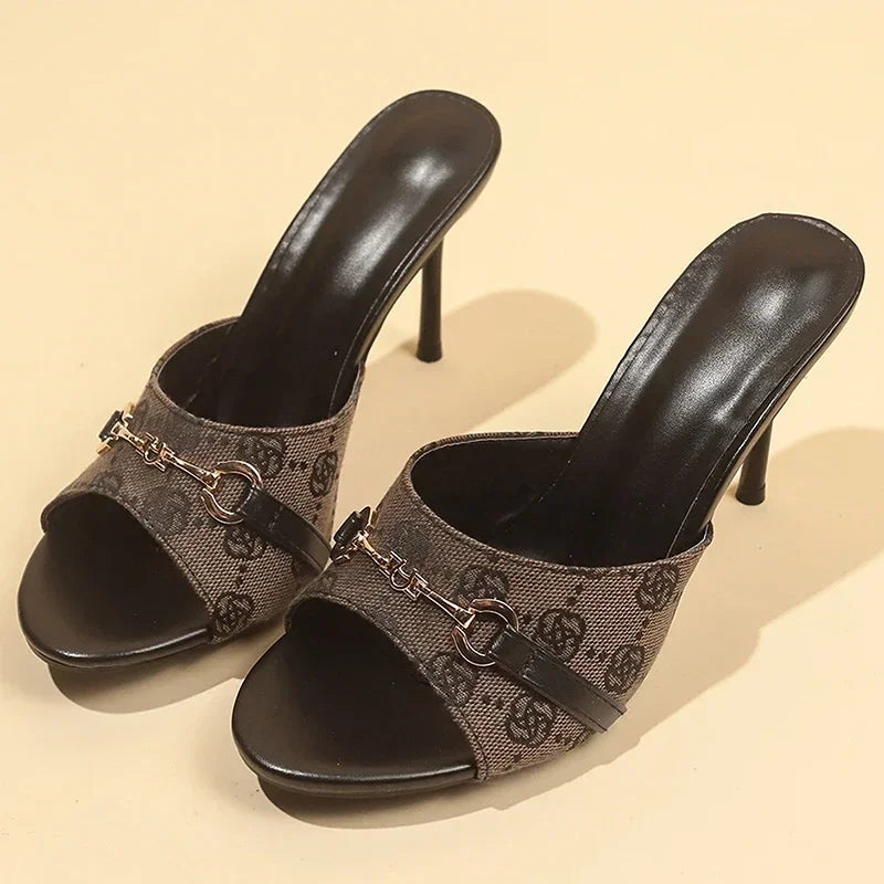 Coffee-brown logo-print slip-on mules with metal buckle detail and slim heel