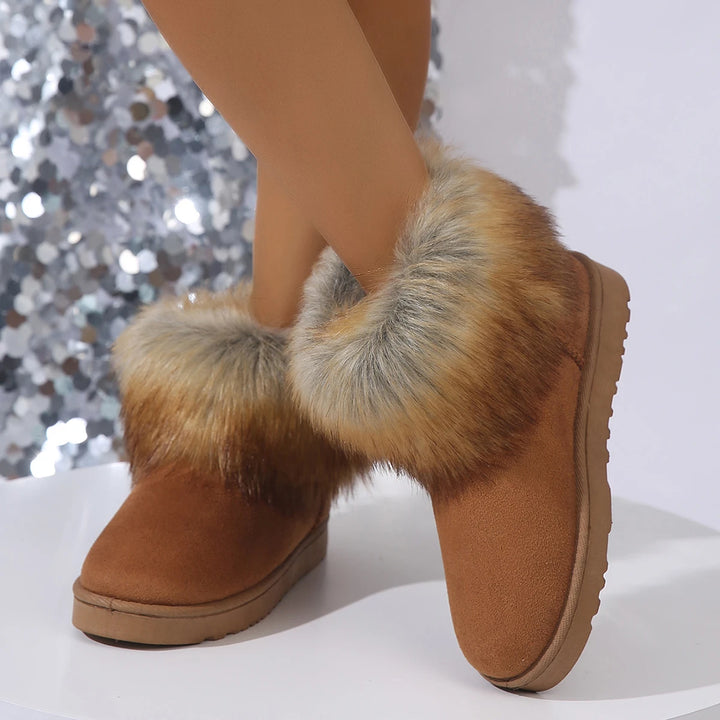Brown plush-lined suede platform boots with faux fur ankle cuffs and chunky sole