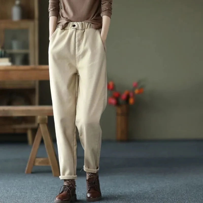 Women's Apricot Thin-Option Harem Pants Styled With A Brown Top And Boots
