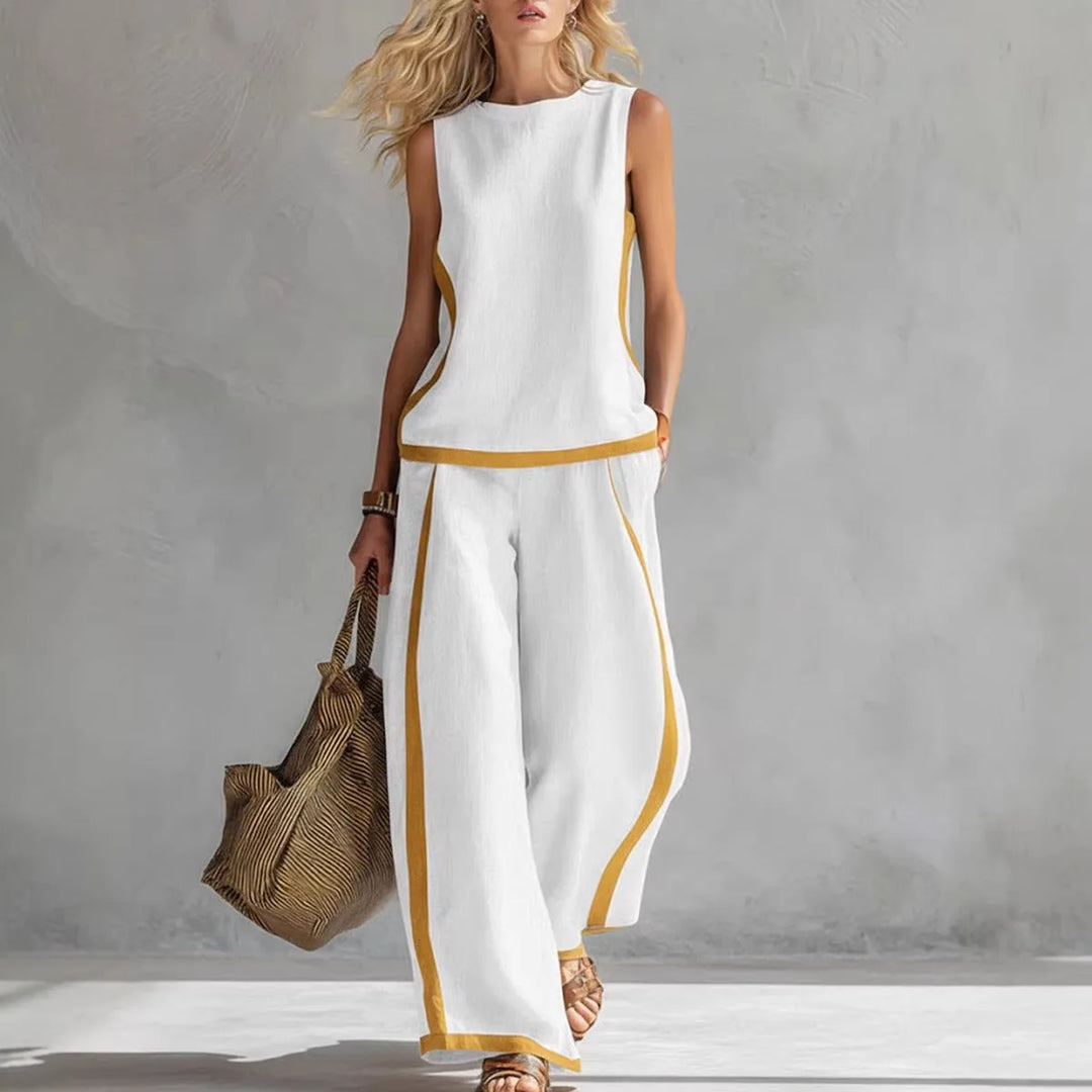 White sleeveless tank and wide-leg pants set with contrast yellow trim.