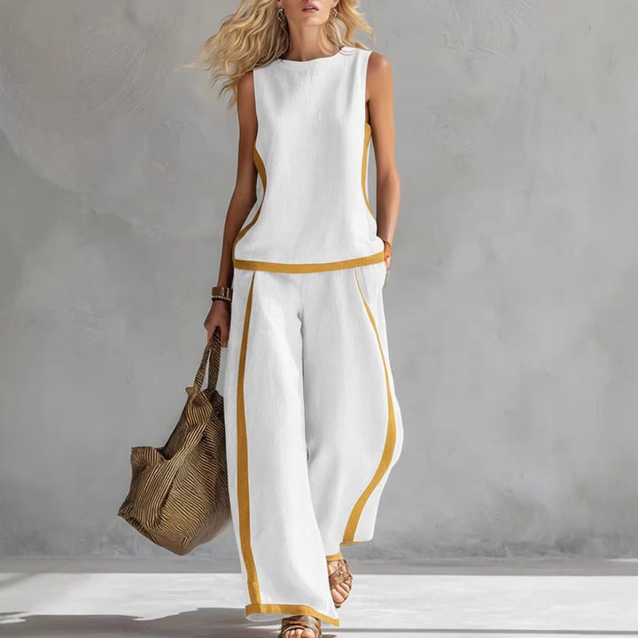 White sleeveless tank and wide-leg pants set with contrast yellow trim.