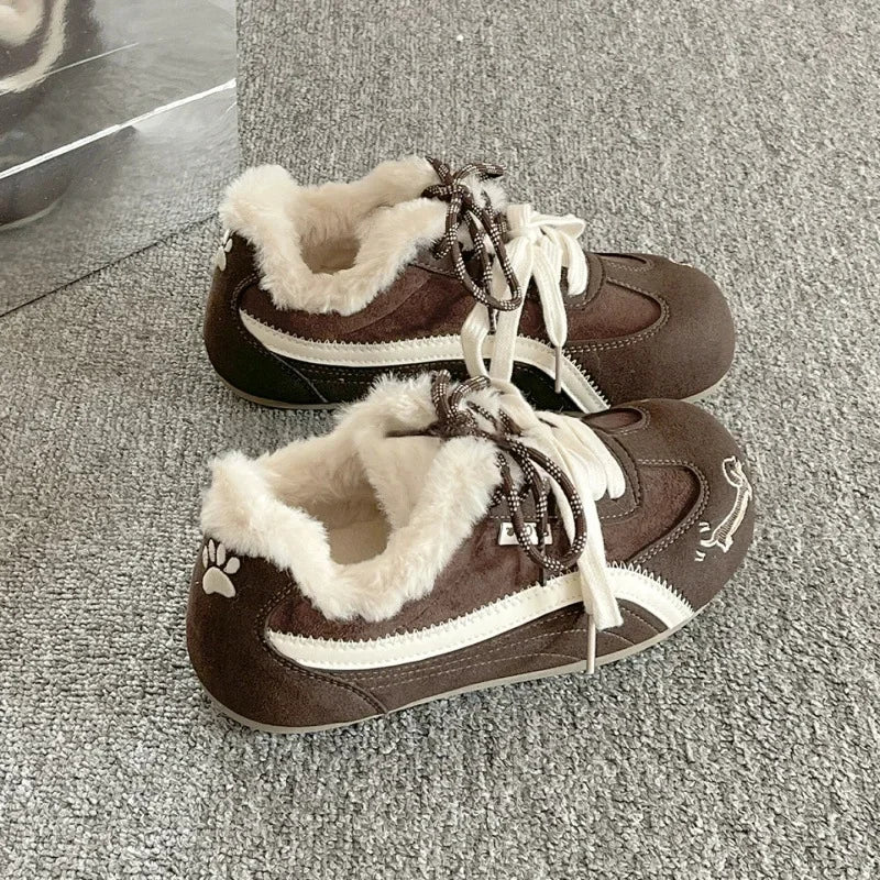Brown suede platform sneakers with faux fur lining, lace-up, and white rubber sole