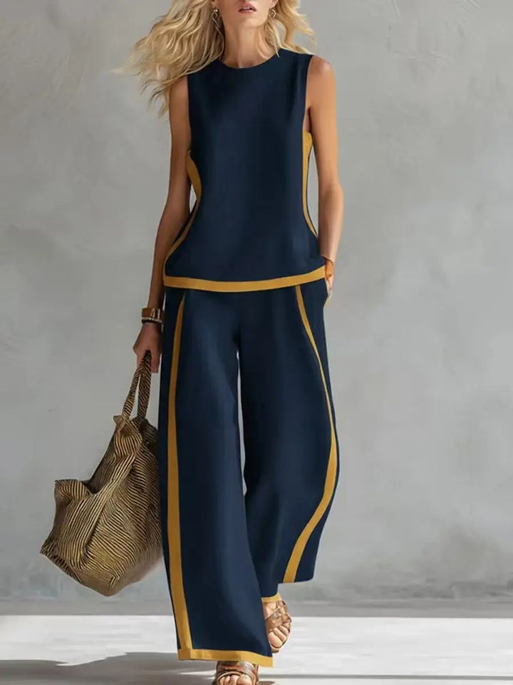 Navy sleeveless tank and wide-leg pants set with contrast yellow side piping.