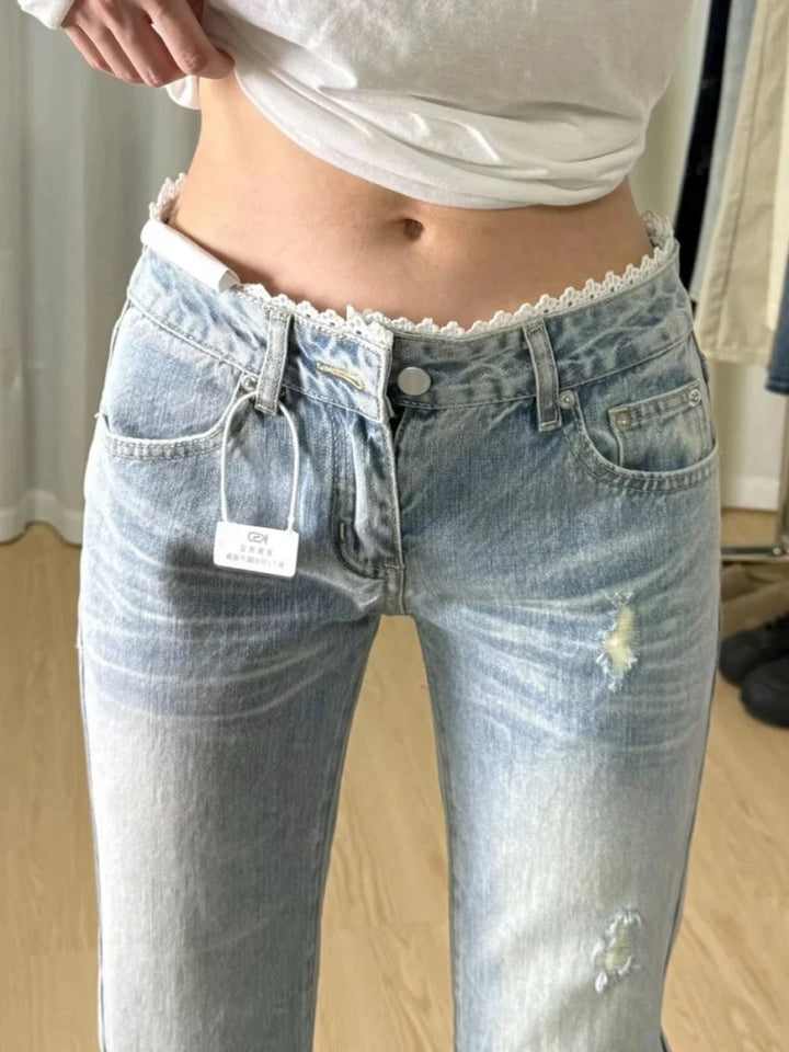 Light-wash plus-size straight-leg jeans, mid-rise; lace-trim waist and tie-front detail