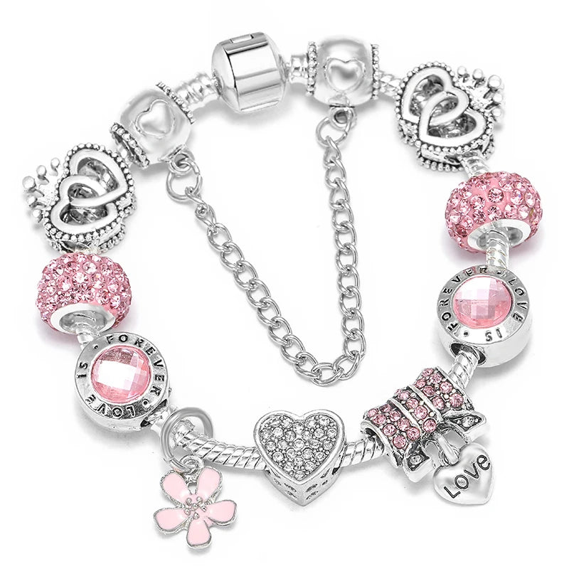 Silberfarbenes Charm-Armband mit pinken Kristallperlen, Herzanhänger und Blumen-Charms