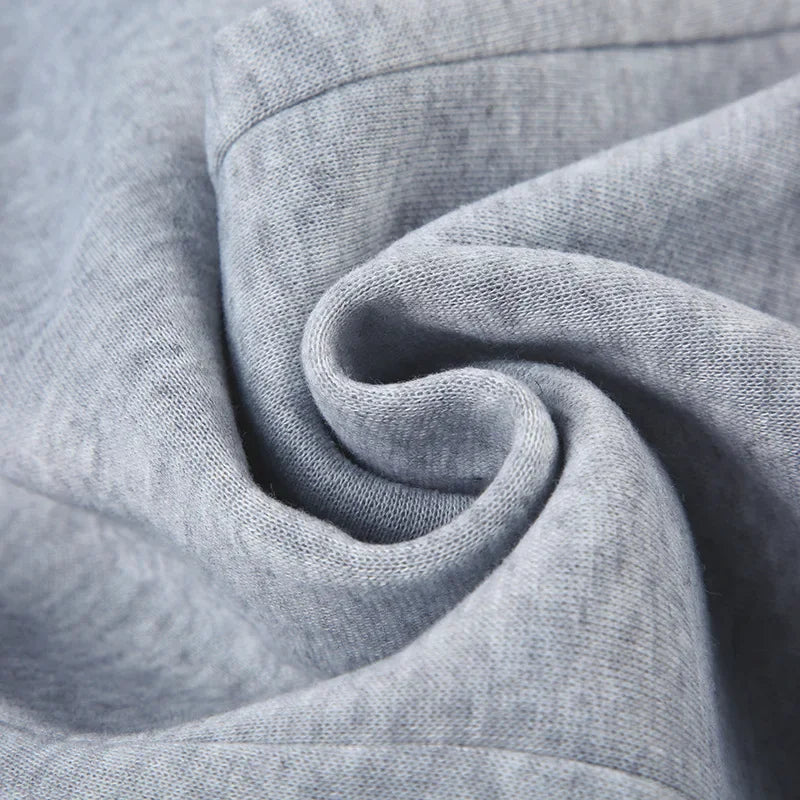 Women's slim-fit bootcut dress pants fabric, heather gray close-up