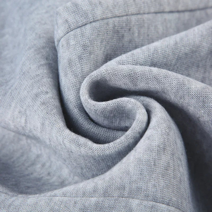 Women's slim-fit bootcut dress pants fabric, heather gray close-up