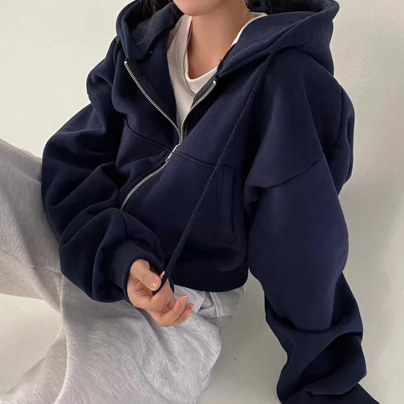 Navy zip-front hooded sweatshirt with full zipper and oversized hood