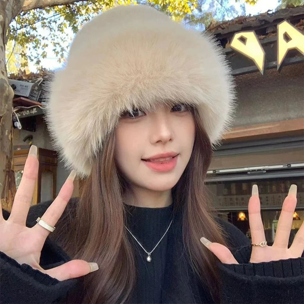 Warm plush faux fur hat, light cream color with rounded ear-cover top