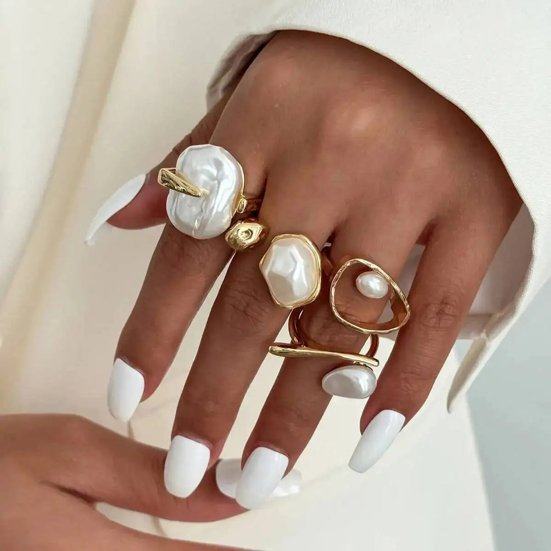 Women's open baroque pearl ring with large white faux pearl on gold-tone band
