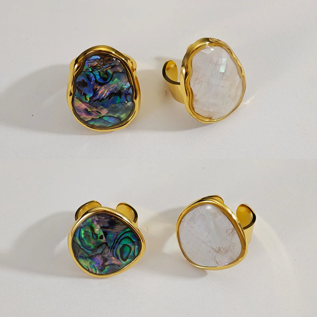 Gold open rings with oval inlays: iridescent abalone and opal-like mother-of-pearl, split band