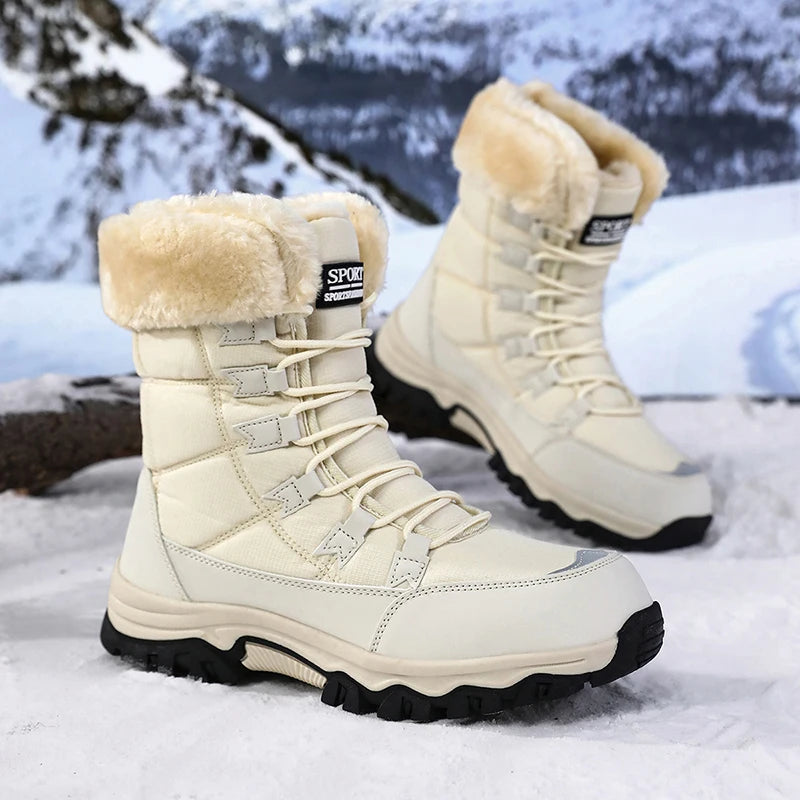 Women’s winter snow boots in light beige with lace-up closure and chunky tread sole.
