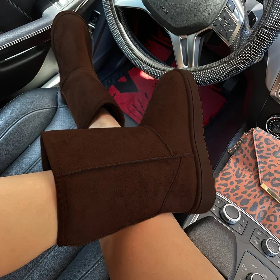 Brown corduroy mid-calf platform snow boots with plush lining, side view