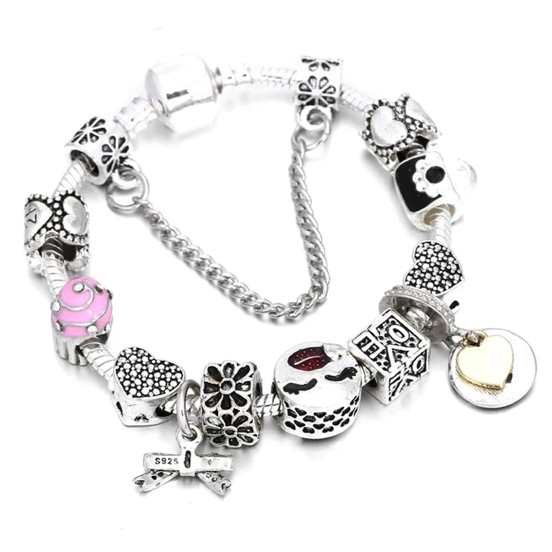 Silberfarbenes Charm-Armband mit gepunkteten Glitzerherz- und Tier-Charms, Herzschließe