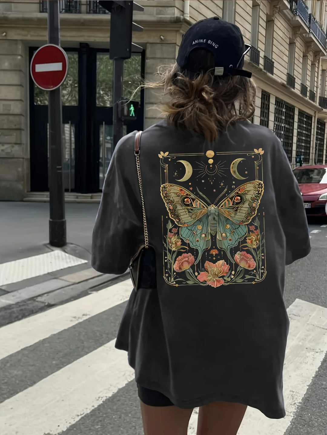 Back view: black cotton tee with butterfly moon flower panel print