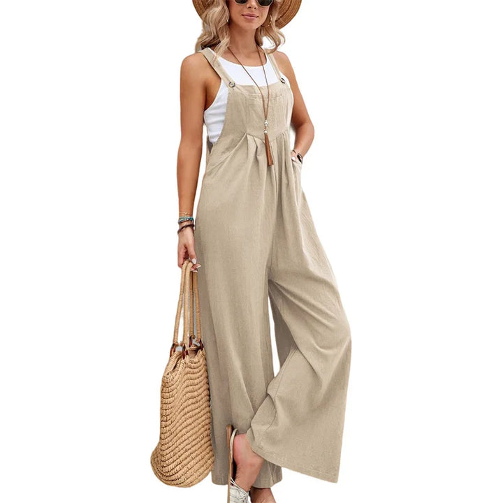 Beige sleeveless wide-leg jumpsuit with square neckline and adjustable straps
