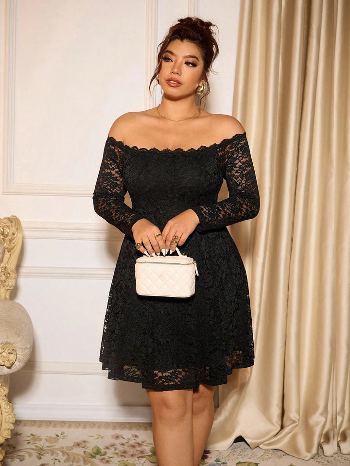 Women's Plus Size Black Off-Shoulder Lace Dress, Front View With White Handbag Held At Waist