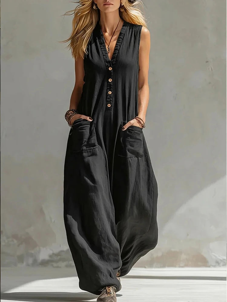 Women's dark sleeveless V-neck button jumpsuit with patch pockets, wide-leg