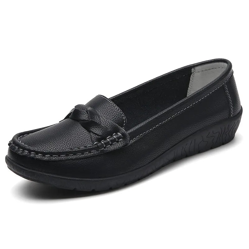 Black loafer shoe on a white background
