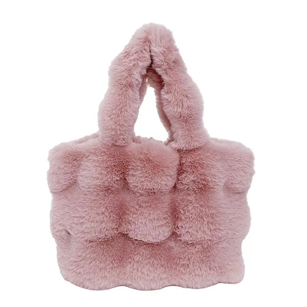 Pink plush faux fur bucket handbag with short loop handles
