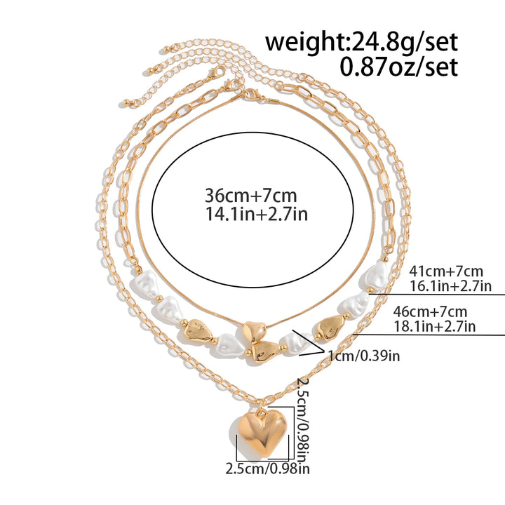 Set of layered necklaces with measurements on a white background
