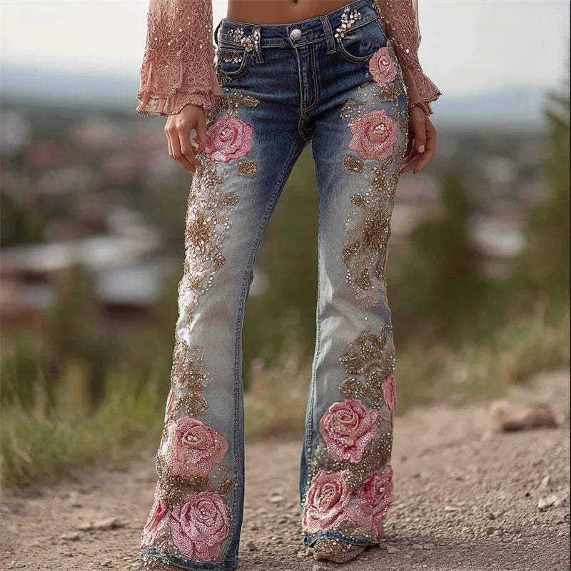 Blue denim bell-bottom jeans with pink rose and gold-embroidered lower-leg details