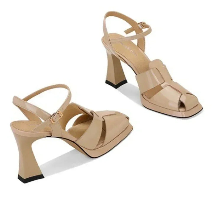 Apricot leather heeled sandals with toe strap, crisscross cutouts, and buckle closure