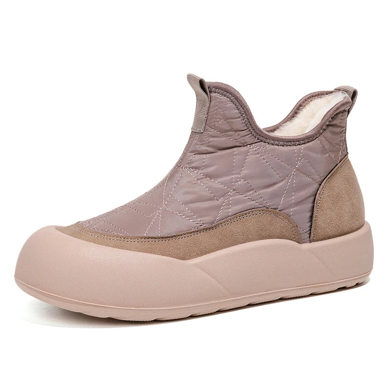 Quilted ankle boot with beige and brown color scheme on a white background