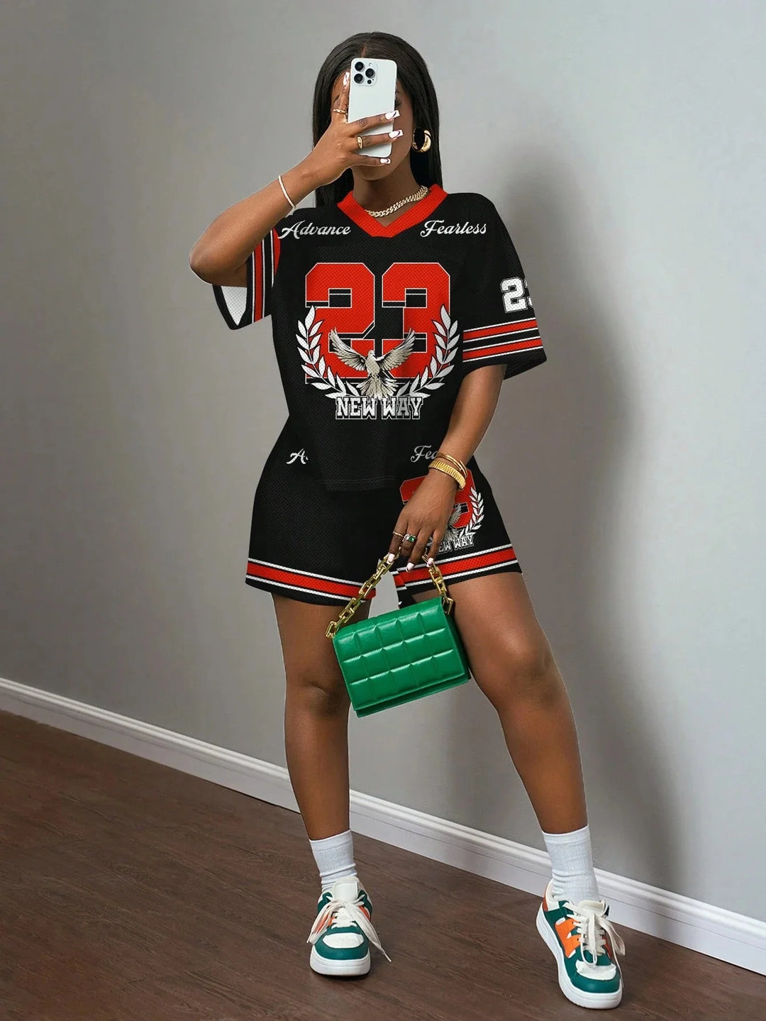 Jersey tee and shorts set, black with red trim and number graphic, matching sporty shorts