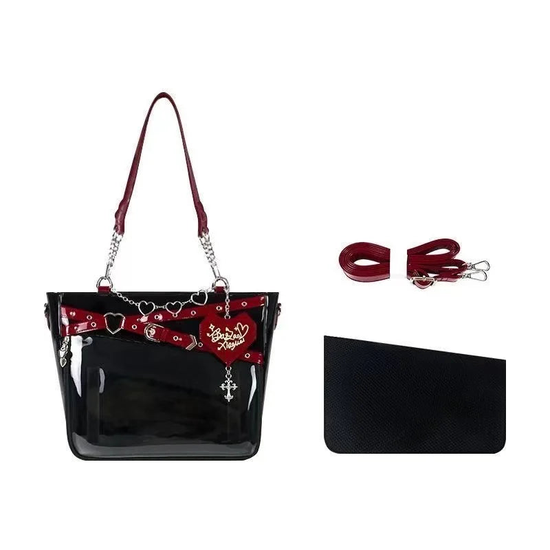 Red and black PU leather shoulder tote with heart chain strap, stud accents, and zip top