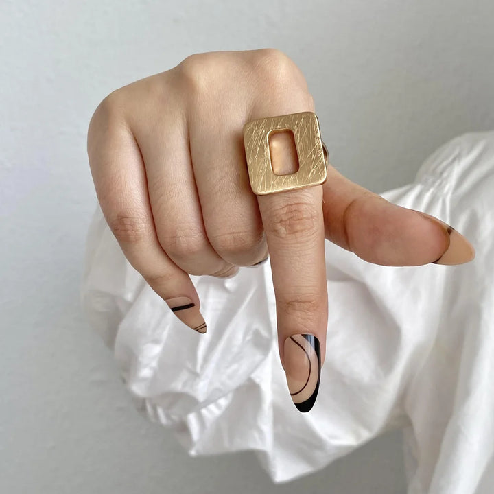 Gold geometric statement ring with square hammered top, adjustable open band