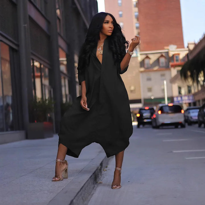 Black loose harem jumpsuit with V-neck and wide legs