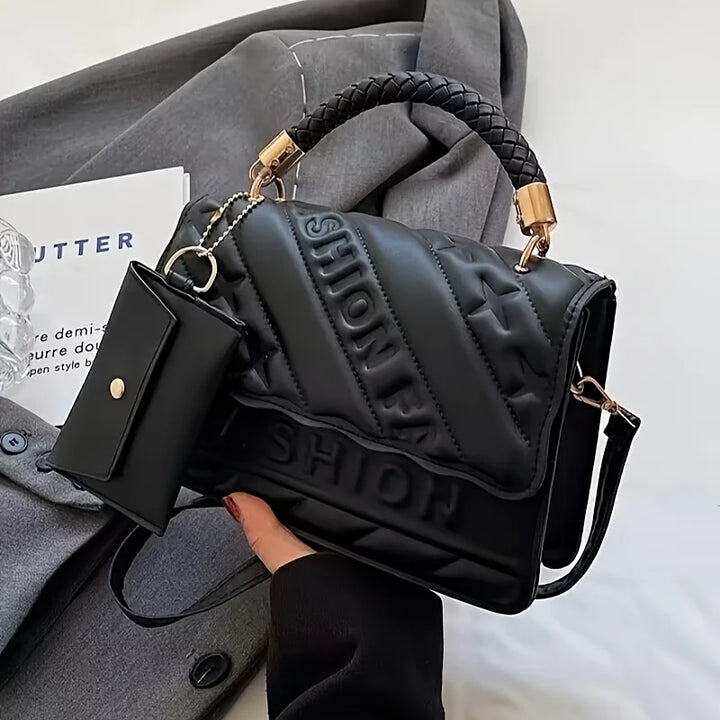 Women’s quilted crossbody bag in black with braided strap and mini coin pouch