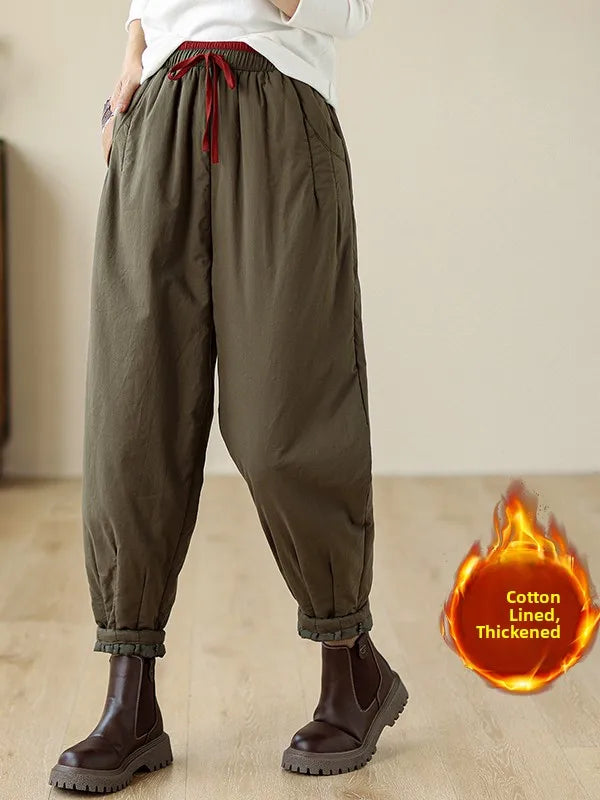 Women's Plus Size Green Harem Pants With Rolled Cuffs Styled With Brown Boots