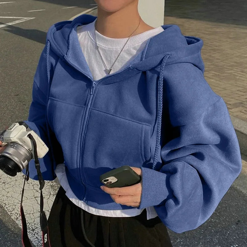 Blue zip-front hooded sweatshirt with adjustable hood and front pouch pocket