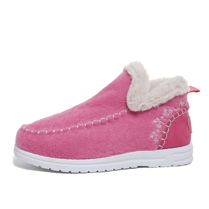 Pink felt slip-on ankle snow loafer with white fleece-lined collar and white sole