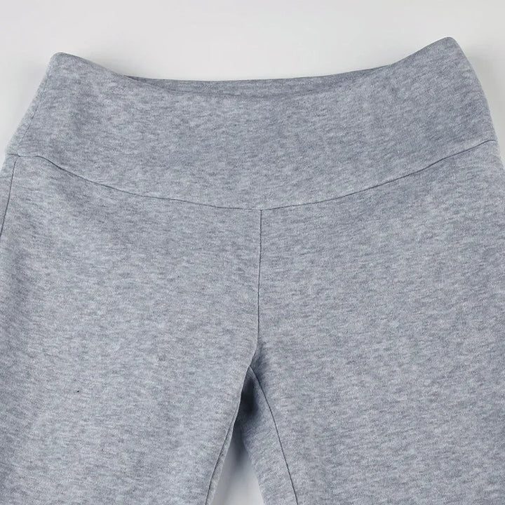 Gray dress pant waistband and front seam detail on slim bootcut legs