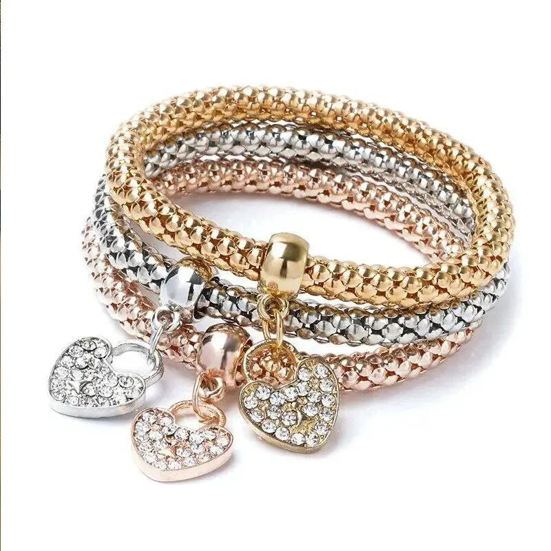Mehrreihiges Armband mit Herz-, Schlüssel- und Schlossanhängern, roséfarben & silbern