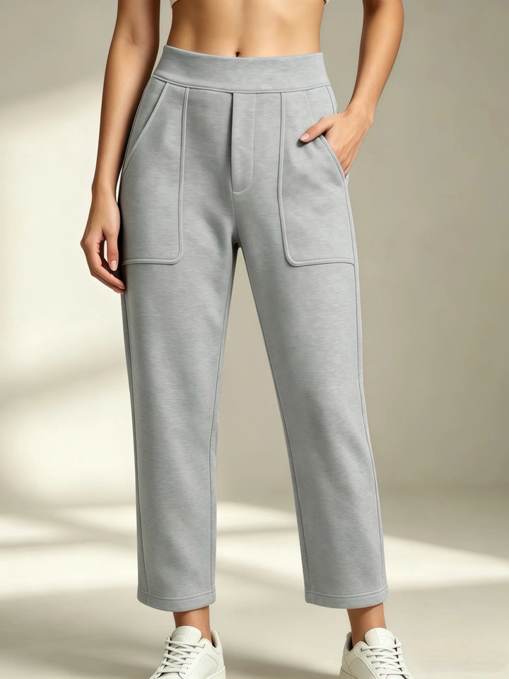 Women's light gray straight-leg sweatpants with an elastic waist and front patch pockets