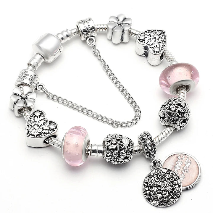 Silbernes Schlangenketten-Armband mit rosa Glasperlen, Herz- und Blumen-Charms sowie Strasskugel
