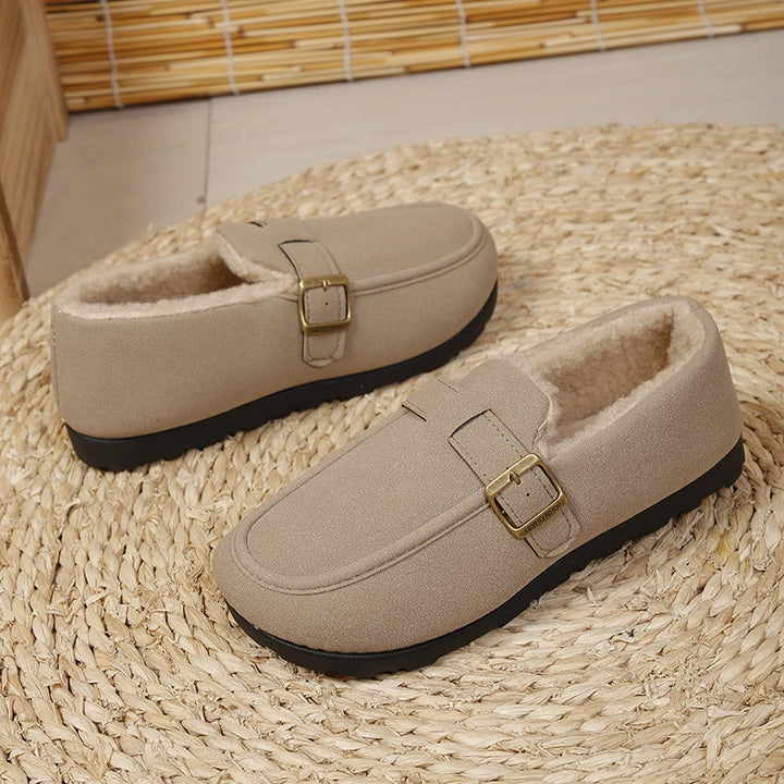 Beige slip-on loafer with gold buckle and short plush lining