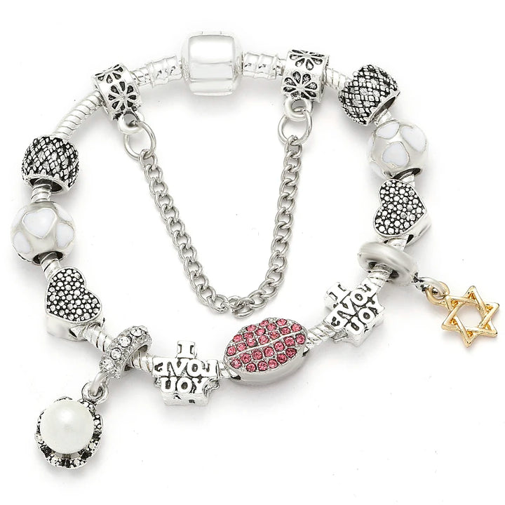 Silbernes Schlangenketten-Armband mit weißen Perlen, Herz-Charm, pinkem Strass-Emblem und Sternanhänger