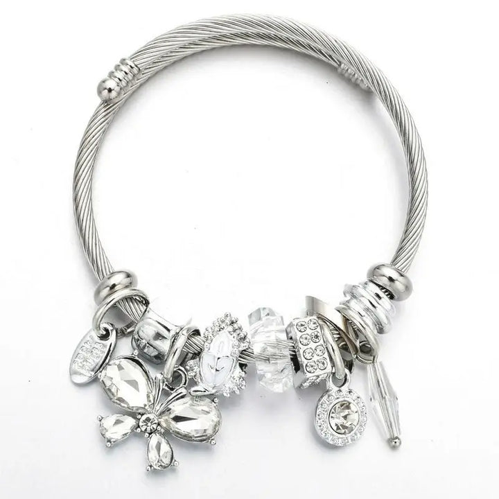 Stainless steel cuff bangle with clear crystal butterfly charms and dangles