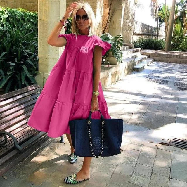 Magenta pink midi dress with puff sleeves and tiered ruffle skirt