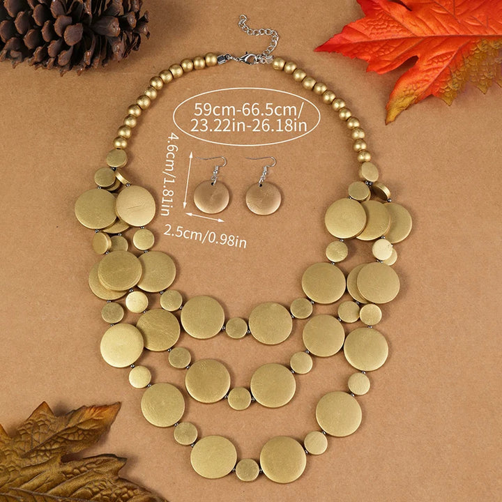Gold-tone multilayer disc beaded necklace with matching round dangle earrings