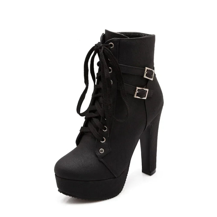 Black high-heeled platform boot with lace-up design on a white background