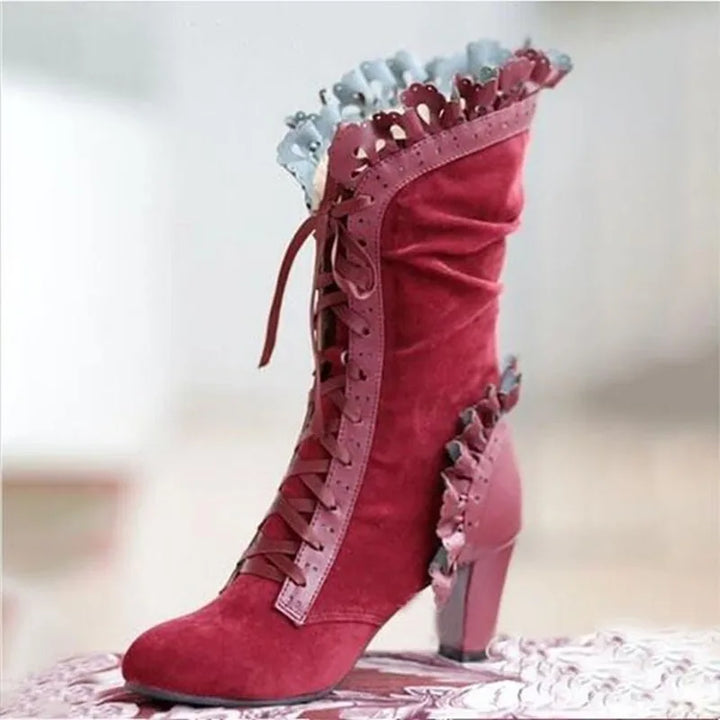 Red mid-calf lace-up high-heel boots with ruffled cuffs and ribbon laces