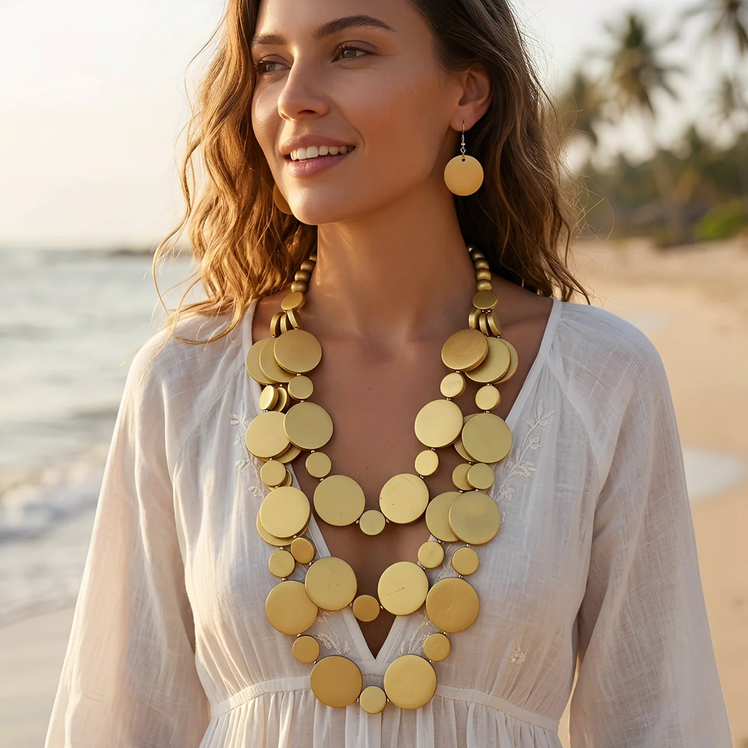 Gold-tone multilayer beaded necklace set with matching round dangle earrings