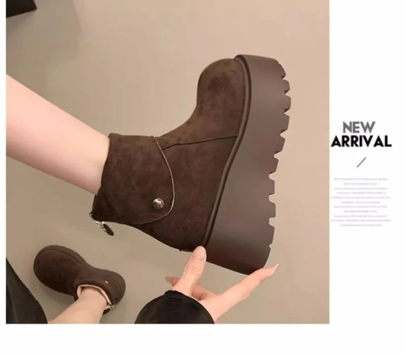 Brown wool-lined ankle boots with side button strap and lug platform sole